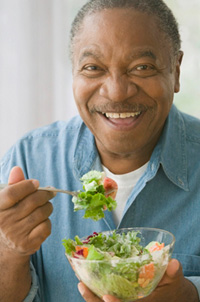 Man enjoying cholesterol-fighting salad